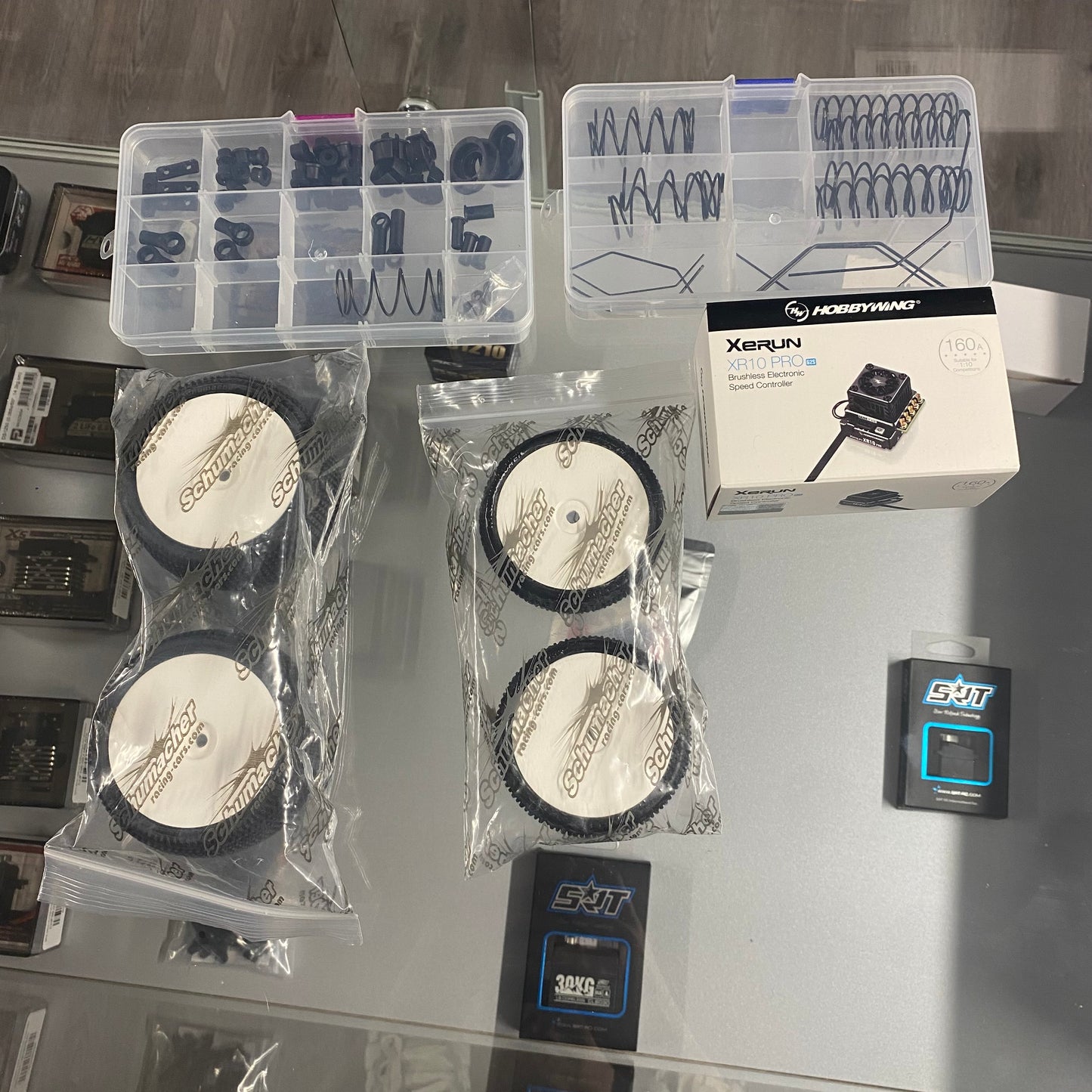PRE-OWNED Xray XB2'25C + Nosram N22 Stock Spec 13.5T Motor + Hobbywing XR10 Pro G2S  + Sanwa PGS-LH II +  Ersatzteile