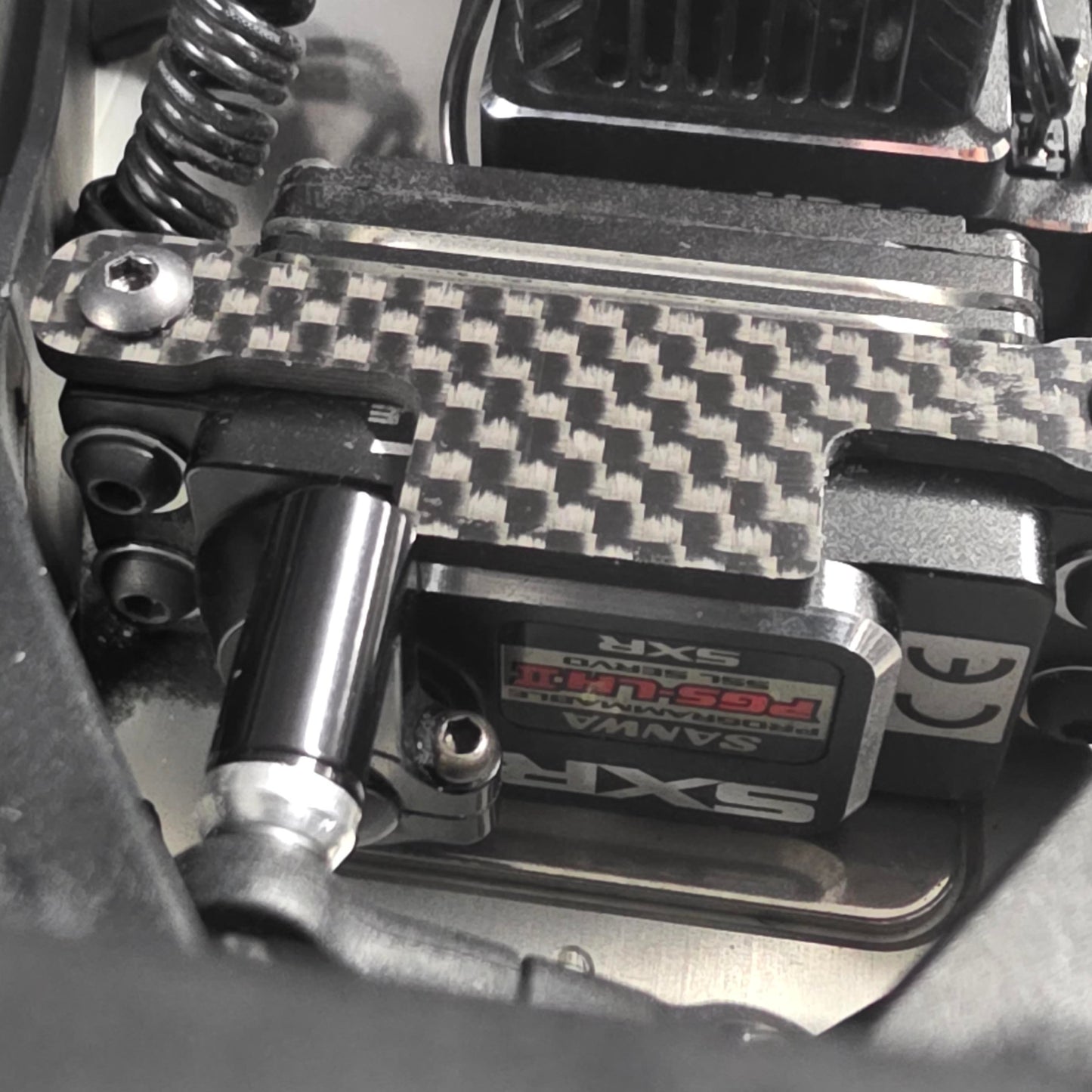 PRE-OWNED Xray XB2'25C + Nosram N22 Stock Spec 13.5T Motor + Hobbywing XR10 Pro G2S  + Sanwa PGS-LH II +  Ersatzteile